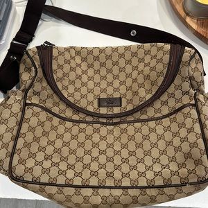 Gucci diaper bag crafted in beige Original GG canvas. AS IS